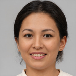 Joyful asian young-adult female with medium  brown hair and brown eyes