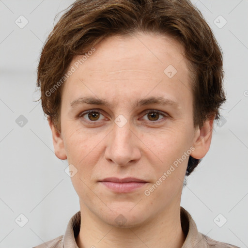 Joyful white adult female with short  brown hair and grey eyes