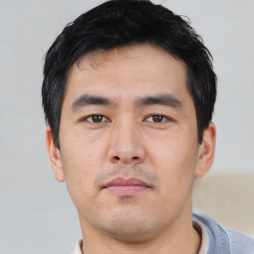 Neutral asian young-adult male with short  black hair and brown eyes