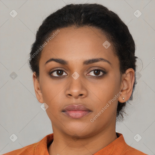 Neutral black young-adult female with short  black hair and brown eyes