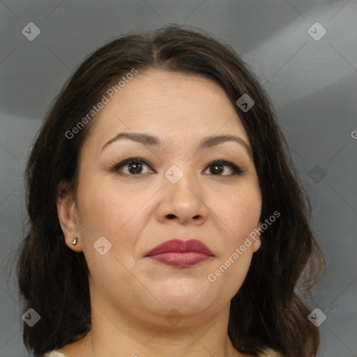 Joyful white adult female with medium  brown hair and brown eyes