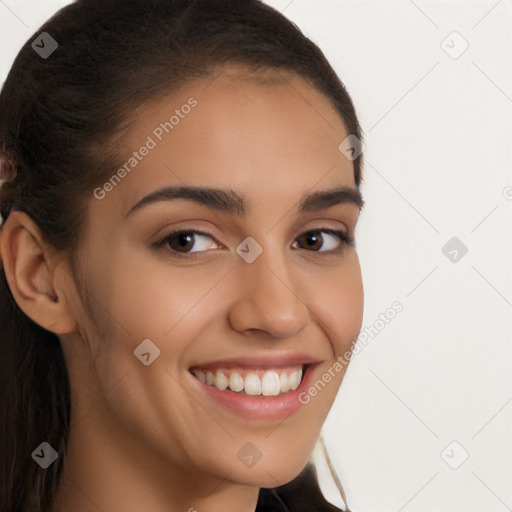 Joyful latino young-adult female with long  brown hair and brown eyes