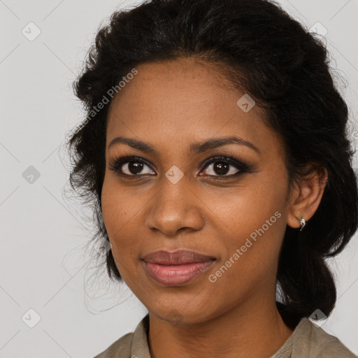 Joyful black young-adult female with medium  brown hair and brown eyes