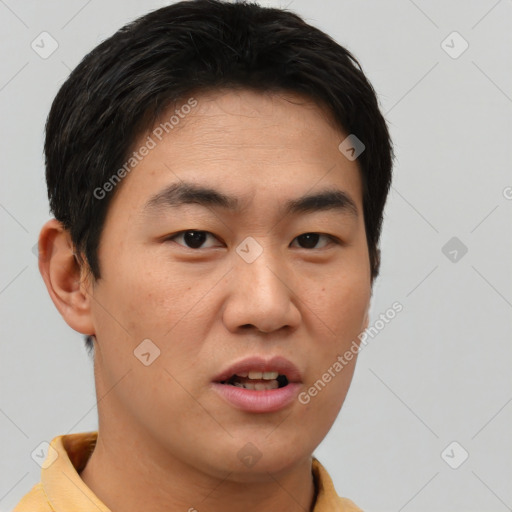 Neutral asian young-adult male with short  black hair and brown eyes