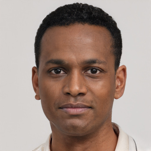 Neutral black young-adult male with short  black hair and brown eyes