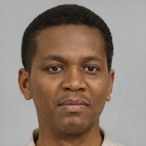 Neutral black young-adult male with short  brown hair and brown eyes