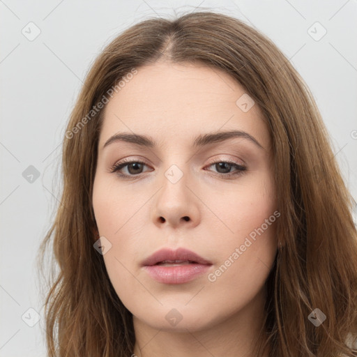 Neutral white young-adult female with long  brown hair and brown eyes