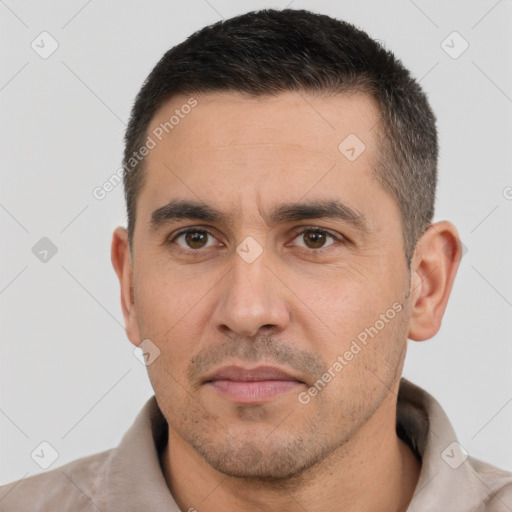 Neutral white adult male with short  brown hair and brown eyes