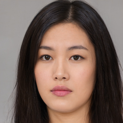 Neutral asian young-adult female with long  brown hair and brown eyes