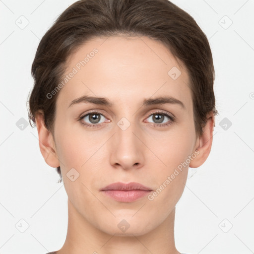 Neutral white young-adult female with short  brown hair and brown eyes