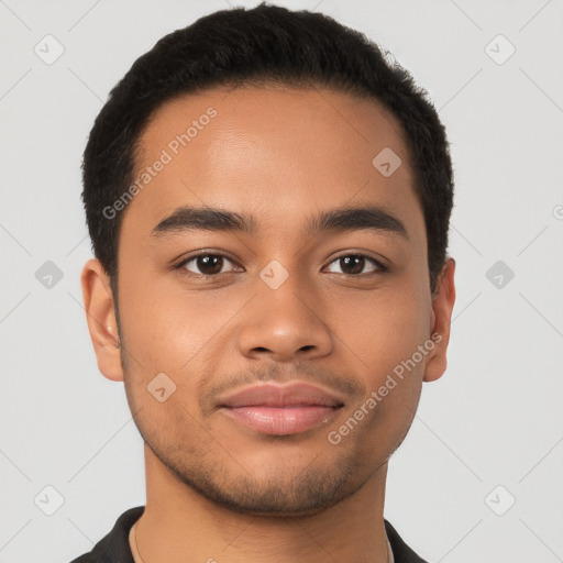 Joyful latino young-adult male with short  brown hair and brown eyes