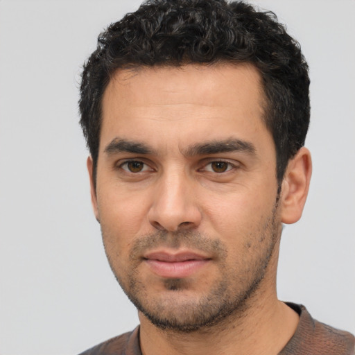 Neutral white young-adult male with short  black hair and brown eyes