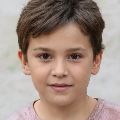 Joyful white child male with short  brown hair and brown eyes