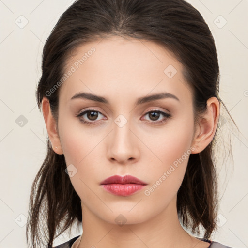 Neutral white young-adult female with medium  brown hair and brown eyes