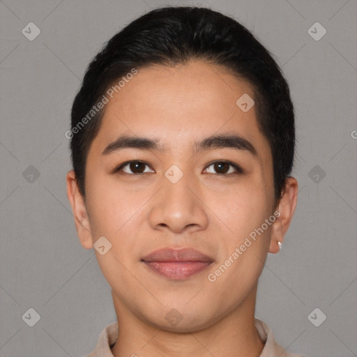 Joyful asian young-adult male with short  black hair and brown eyes