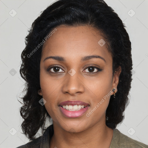 Joyful black young-adult female with long  black hair and brown eyes