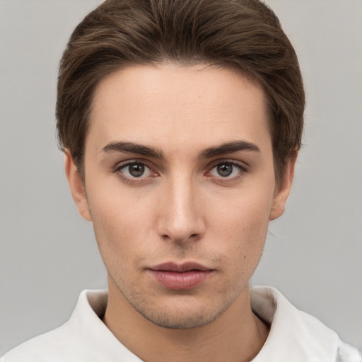 Neutral white young-adult male with short  brown hair and brown eyes