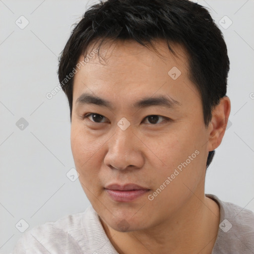 Neutral asian young-adult male with short  black hair and brown eyes