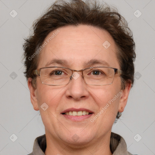 Joyful white middle-aged female with short  brown hair and grey eyes