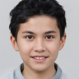 Joyful white child male with short  brown hair and brown eyes