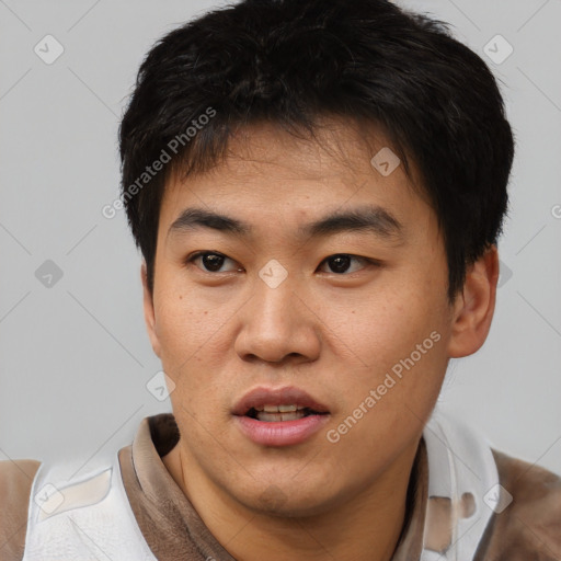Neutral asian young-adult male with short  black hair and brown eyes