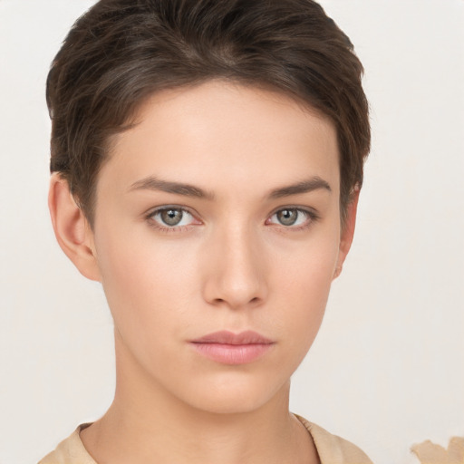 Neutral white young-adult female with short  brown hair and brown eyes