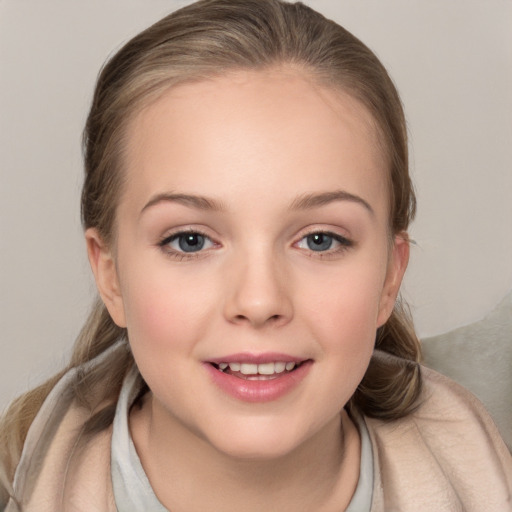 Joyful white child female with medium  brown hair and grey eyes