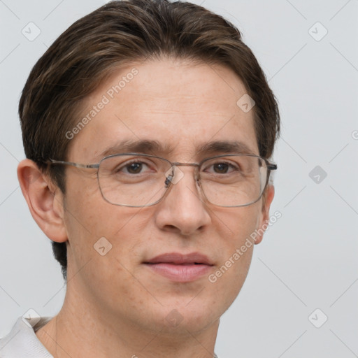 Joyful white adult male with short  brown hair and grey eyes