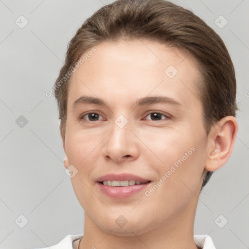 Joyful white young-adult female with short  brown hair and brown eyes