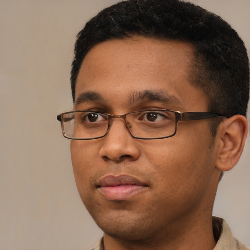 Neutral black young-adult male with short  brown hair and brown eyes