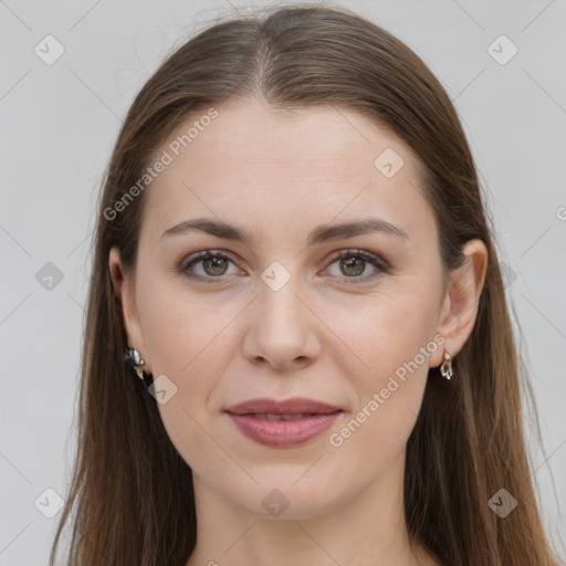 Joyful white young-adult female with long  brown hair and grey eyes