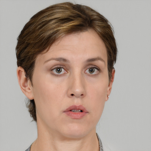 Neutral white young-adult female with short  brown hair and brown eyes