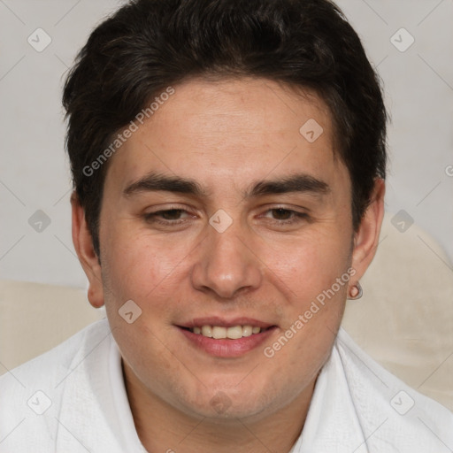 Joyful white adult male with short  brown hair and brown eyes