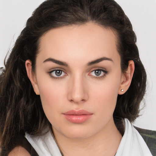 Neutral white young-adult female with medium  brown hair and brown eyes