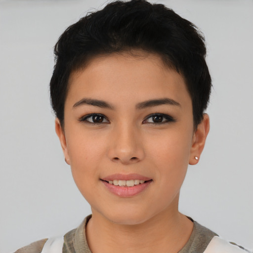 Joyful asian young-adult female with short  black hair and brown eyes