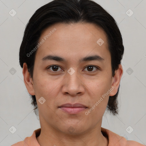 Joyful asian young-adult male with short  brown hair and brown eyes