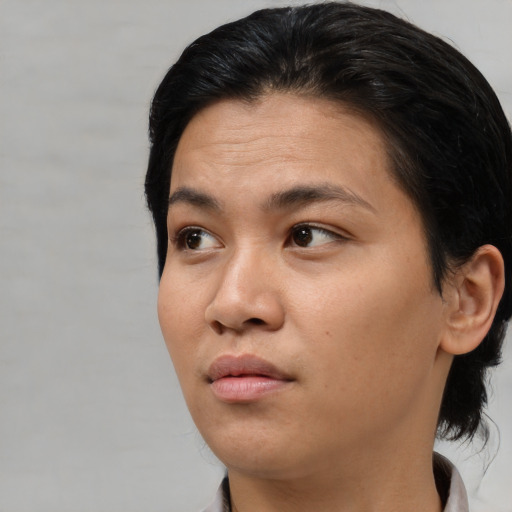 Neutral asian young-adult female with medium  black hair and brown eyes
