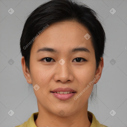 Joyful asian young-adult female with short  brown hair and brown eyes