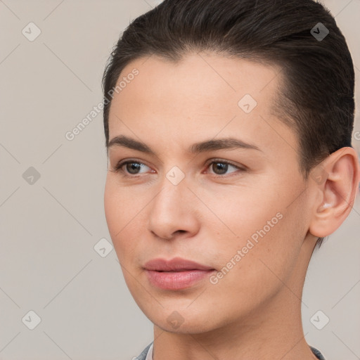 Joyful white young-adult female with short  brown hair and brown eyes