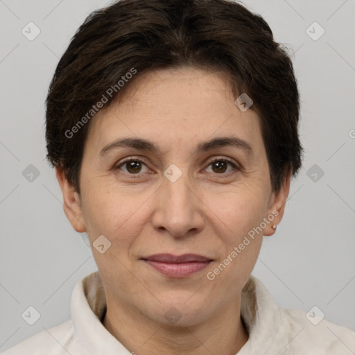 Joyful white adult female with short  brown hair and brown eyes