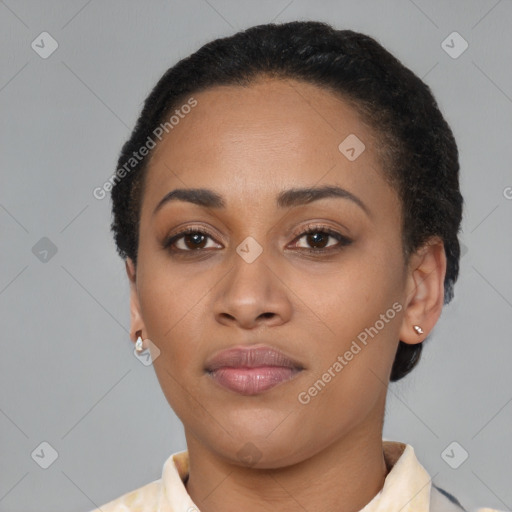 Joyful latino young-adult female with short  black hair and brown eyes