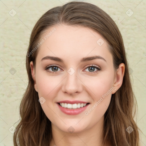 Joyful white young-adult female with long  brown hair and green eyes