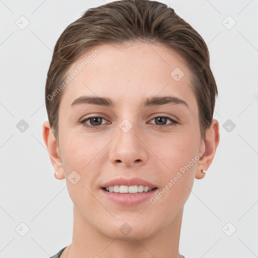 Joyful white young-adult female with short  brown hair and grey eyes