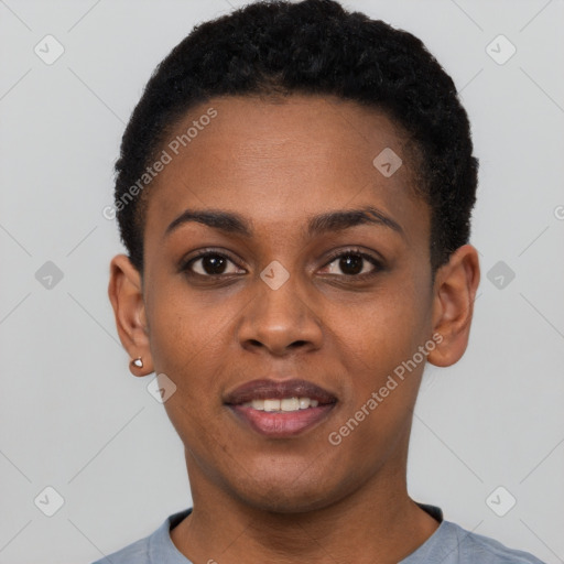 Joyful black young-adult female with short  black hair and brown eyes