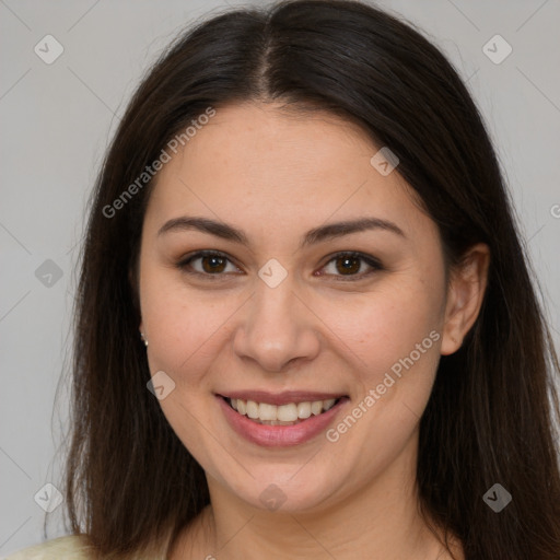 Joyful white young-adult female with long  brown hair and brown eyes