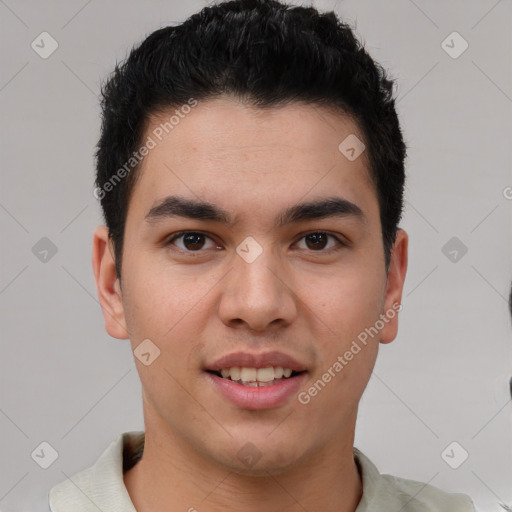 Joyful latino young-adult male with short  brown hair and brown eyes