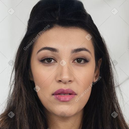 Joyful latino young-adult female with long  brown hair and brown eyes