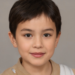 Joyful white child male with short  brown hair and brown eyes