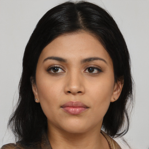 Neutral latino young-adult female with medium  black hair and brown eyes