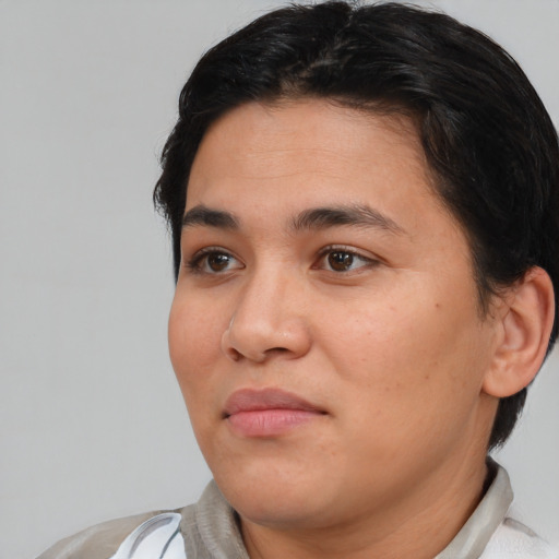 Joyful white young-adult female with short  brown hair and brown eyes